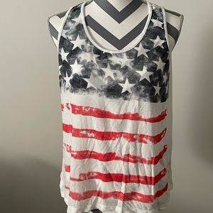 Tank top, sweater like.